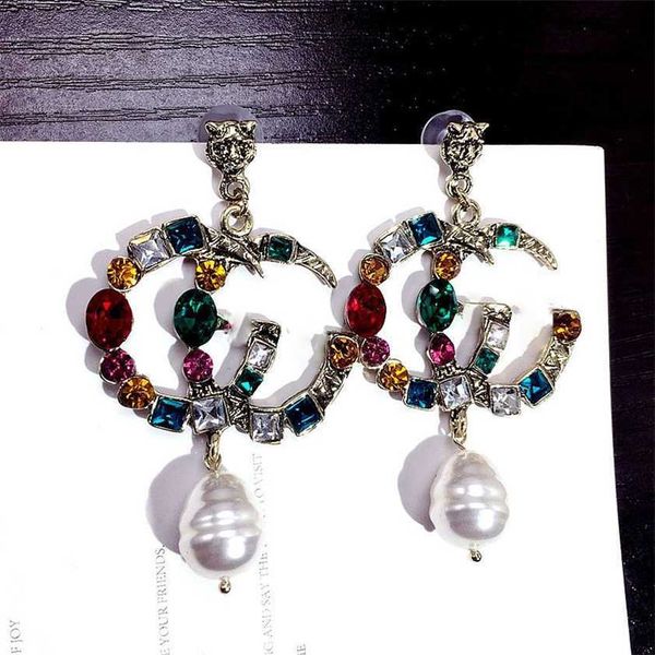 2023 designer new colorful crystal exaggerated letter irregular pearl personalized earrings show face thin earrings, Golden
2023 designer new colorful crystal exaggerated letter irregular pearl personalized earrings show face thin earrings, Golden
