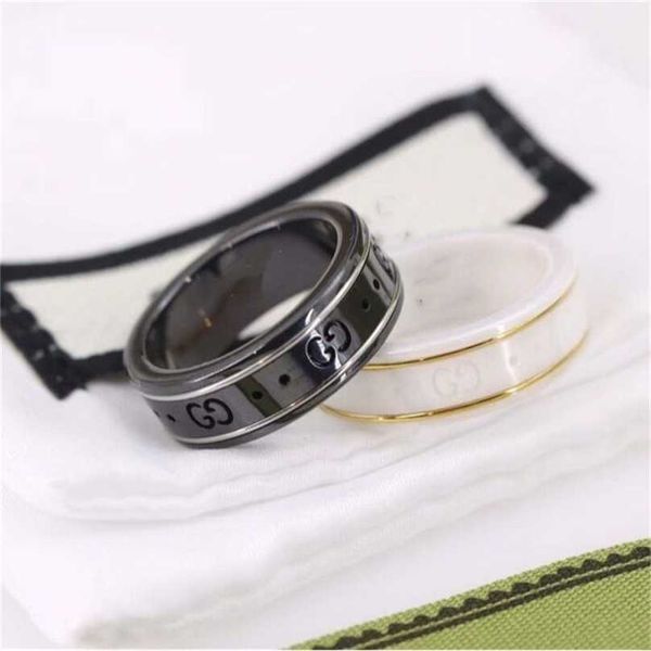 2023 designer new jewelry sterling silver black and white ceramic double letter hand couple ring
2023 designer new jewelry sterling silver black and white ceramic double letter hand couple ring