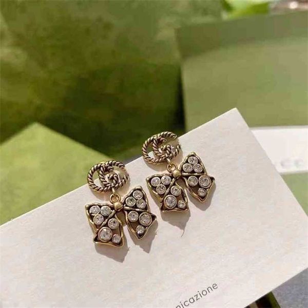 2023 designer new s925 silver needle brass old minority personality bow, full diamond earrings, family earrings, Golden
2023 designer new s925 silver needle brass old minority personality bow, full diamond earrings, family earrings, Golden