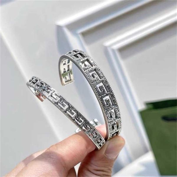 2023 designer new jewelry sterling silver double carved opening hollowed out letters old simple men's and women's wide version bra, Black
2023 designer new jewelry sterling silver double carved opening hollowed out letters old simple men's and women's wide version bra, Black