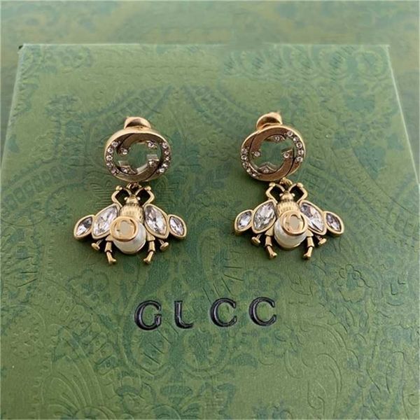 2023 designer new fashion jewelry earrings ancient family letter inlaid eye diamond bee pearl fashion trend earrings, Golden
2023 designer new fashion jewelry earrings ancient family letter inlaid eye diamond bee pearl fashion trend earrings, Golden