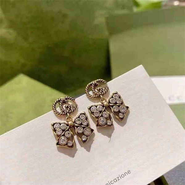2023 designer new s925 silver needle brass old minority personality bow, full diamond earrings, family earrings, Golden
2023 designer new s925 silver needle brass old minority personality bow, full diamond earrings, family earrings, Golden