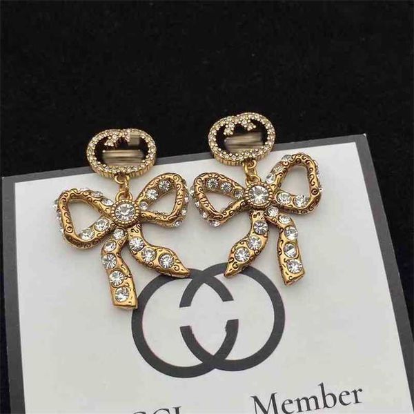 2023 designer new gujia inlaid rhinestone bow earrings female classic double interlocking earringskjnk, Golden
2023 designer new gujia inlaid rhinestone bow earrings female classic double interlocking earringskjnk, Golden