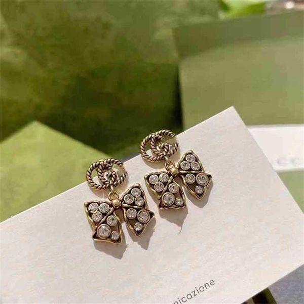 2023 designer new s925 silver needle brass old minority personality bow, full diamond earrings, family earrings, Golden
2023 designer new s925 silver needle brass old minority personality bow, full diamond earrings, family earrings, Golden
