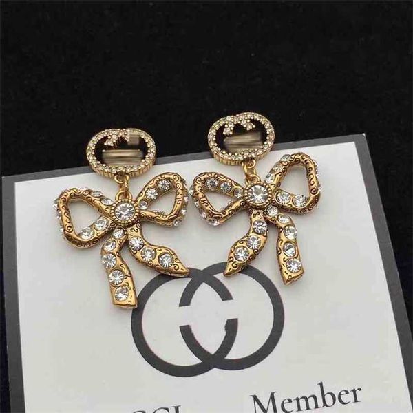 2023 designer new gujia inlaid rhinestone bow earrings female classic double interlocking earringskjnk, Golden
2023 designer new gujia inlaid rhinestone bow earrings female classic double interlocking earringskjnk, Golden