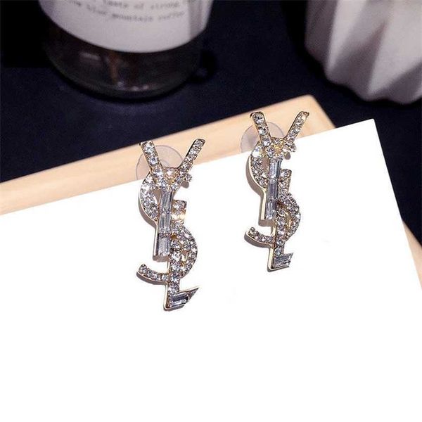 2023 designer new korean new full diamond letter super flash crystal fashion net red evening dress silver needle earrings, Golden
2023 designer new korean new full diamond letter super flash crystal fashion net red evening dress silver needle earrings, Golden