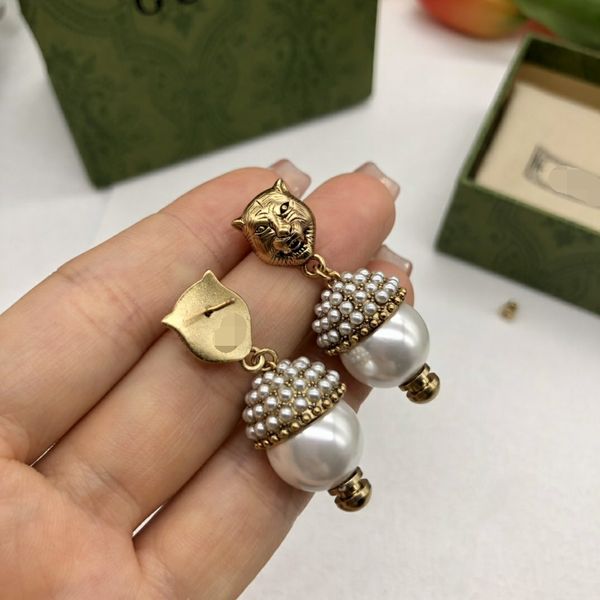street fashion women studs earrings luxury designer jewelry pearl lion earring ladies ear studs retro designers d2111036f ge-0129, Golden;silver
street fashion women studs earrings luxury designer jewelry pearl lion earring ladies ear studs retro designers d2111036f ge-0129, Golden;silver