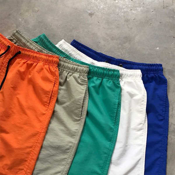 men's shorts youth summer new fashion loose tiled capris candy color men's color quick drying beach pants, White;black
men's shorts youth summer new fashion loose tiled capris candy color men's color quick drying beach pants, White;black