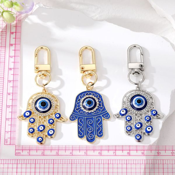 evil eye hamsa hand keychain key ring for women men hollow fatima hand blue eye bag car key accessories, Slivery;golden
evil eye hamsa hand keychain key ring for women men hollow fatima hand blue eye bag car key accessories, Slivery;golden