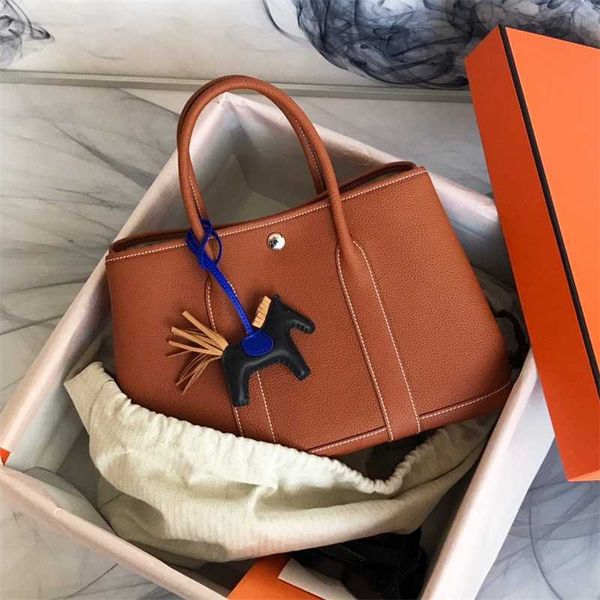garden bag designer handmade wax line party togo cowhide business handbag leisure commuter tote women's zc
garden bag designer handmade wax line party togo cowhide business handbag leisure commuter tote women's zc