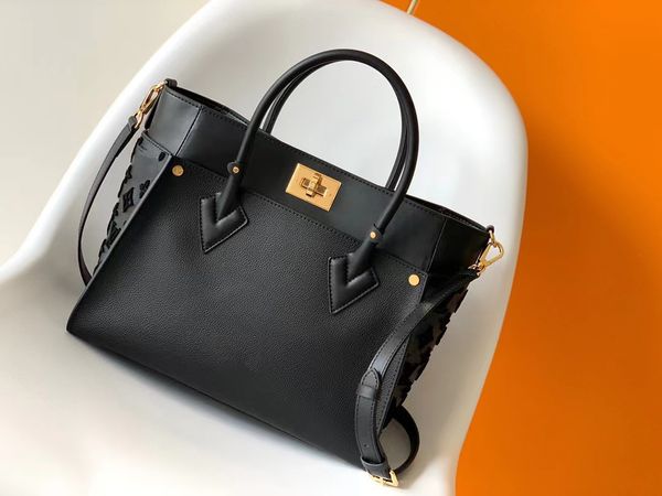luxuries designers shoulder handbag tote bag designer handle bag togo cowhide real leather black handbag women medium handmade gold lock pur
luxuries designers shoulder handbag tote bag designer handle bag togo cowhide real leather black handbag women medium handmade gold lock pur