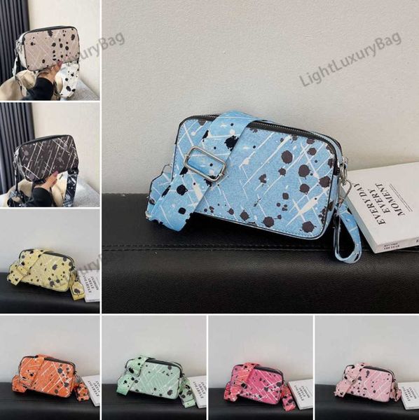5a designer spots pattern camera bags fashion crossbody tote outdoor sports wallets womens leather classic luxury handbags female purses2303
5a designer spots pattern camera bags fashion crossbody tote outdoor sports wallets womens leather classic luxury handbags female purses2303
