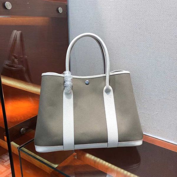 garden party bag handbag designer women family garden bag women's fashion leather large capacity bucket bag shoulder handbag tote qq
garden party bag handbag designer women family garden bag women's fashion leather large capacity bucket bag shoulder handbag tote qq