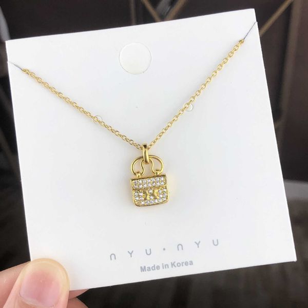 pendant necklaces strands strings korean version gold-plated h-bag steel necklace for women's color-resistant full of diamonds light an, Silver
pendant necklaces strands strings korean version gold-plated h-bag steel necklace for women's color-resistant full of diamonds light an, Silver