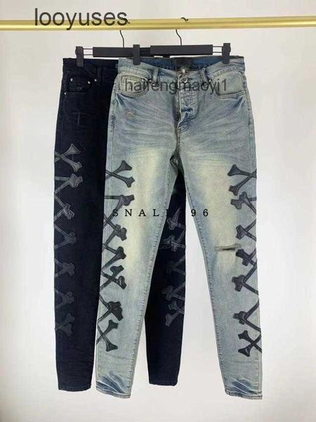 es designer jean jeans european american small bone collage hole destruction elastic light blue denim pants trend
es designer jean jeans european american small bone collage hole destruction elastic light blue denim pants trend