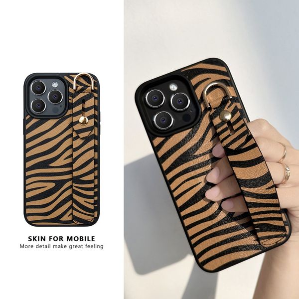 mobile phone case suitable for 14promax 13 leather case 12 stripe wrist strap bracket case
mobile phone case suitable for 14promax 13 leather case 12 stripe wrist strap bracket case