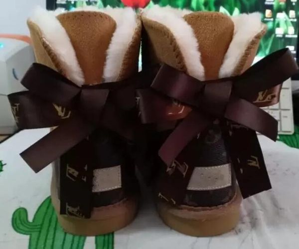 aus l bow u short women snow boots soft comfortable sheepskin keep warm plush boots with card dustbag beautiful gifts, Black
aus l bow u short women snow boots soft comfortable sheepskin keep warm plush boots with card dustbag beautiful gifts, Black