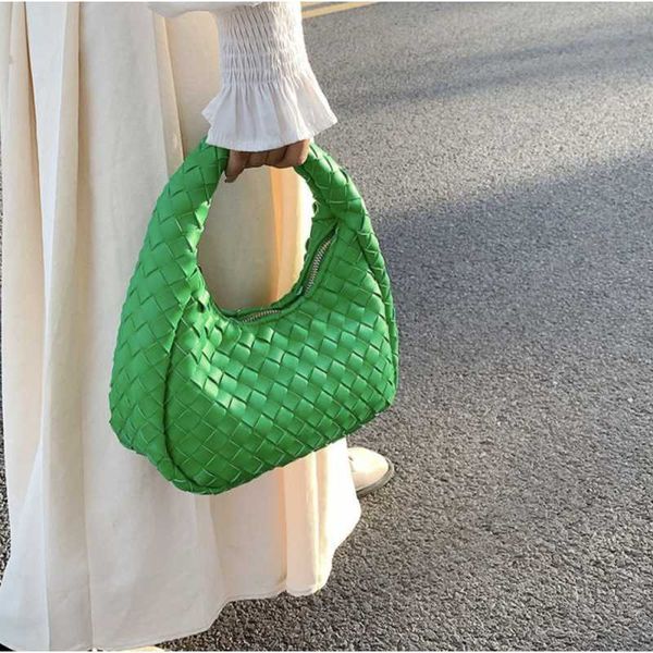 botega venates jodie mini teen intrecciato pouch hands fashion woven texture tide dumpling bag personalized hand carry underarm bag
botega venates jodie mini teen intrecciato pouch hands fashion woven texture tide dumpling bag personalized hand carry underarm bag