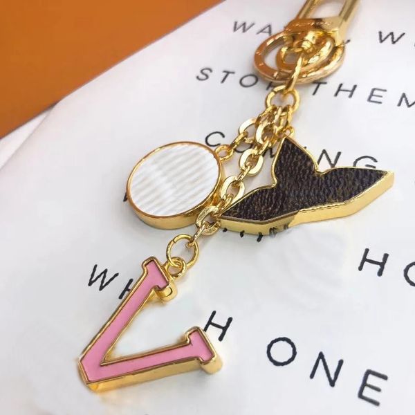 luxury designer keychain fashion classic brand key buckle letter design handmade gold keychains mens womens bag pendant 55, Silver
luxury designer keychain fashion classic brand key buckle letter design handmade gold keychains mens womens bag pendant 55, Silver