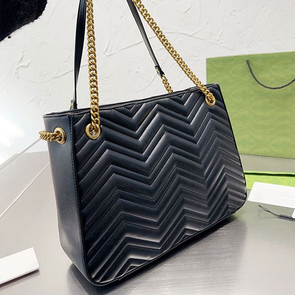 cowhide tote bag large capacity handbags women shoulder bags classic quilting thread gold hardware interior zipper pocket sliding metal chai
cowhide tote bag large capacity handbags women shoulder bags classic quilting thread gold hardware interior zipper pocket sliding metal chai