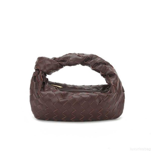 botega venates jodie mini teen intrecciato pouch small design oxhorn woven springsummer knot handheld cloud bag
botega venates jodie mini teen intrecciato pouch small design oxhorn woven springsummer knot handheld cloud bag