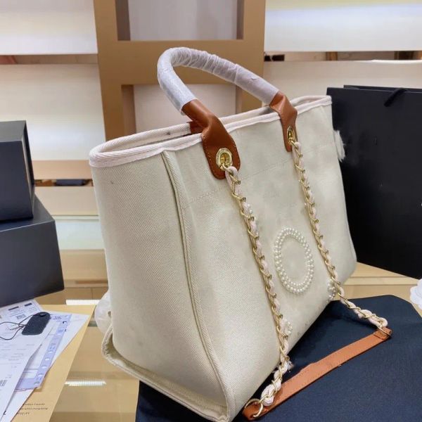 pink tote shoulder bag channel handle designer bag cc canvas pearl large beach handbag totes with chain strap shopping wallet purses designe
pink tote shoulder bag channel handle designer bag cc canvas pearl large beach handbag totes with chain strap shopping wallet purses designe