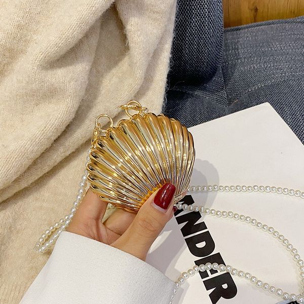 evening bags designer metal shell luxury mini lipstick pearl chain crossbody for women shoulder handbag and purse waist 230321
evening bags designer metal shell luxury mini lipstick pearl chain crossbody for women shoulder handbag and purse waist 230321