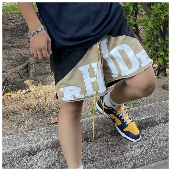 men's shorts high street fashion brand rhude letter printing two-color patchwork drawcord men's loose shorts beach sports pants, White;black
men's shorts high street fashion brand rhude letter printing two-color patchwork drawcord men's loose shorts beach sports pants, White;black