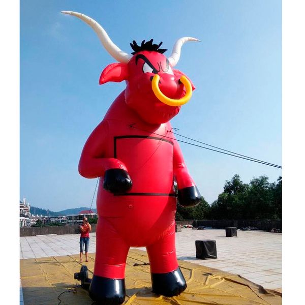 Image of Red giant inflatable bull cartoon model for advertising and outdoor decoration