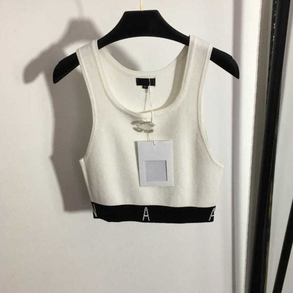 23ss designer women brand knitted vest match logo brooch elastic force slimming color matching vests womens clothes a1, White
23ss designer women brand knitted vest match logo brooch elastic force slimming color matching vests womens clothes a1, White
