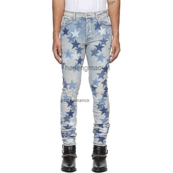 designer men jeans ch high street tide brand wash water used blue full of five pointed star stickers with holes and slim fit
designer men jeans ch high street tide brand wash water used blue full of five pointed star stickers with holes and slim fit