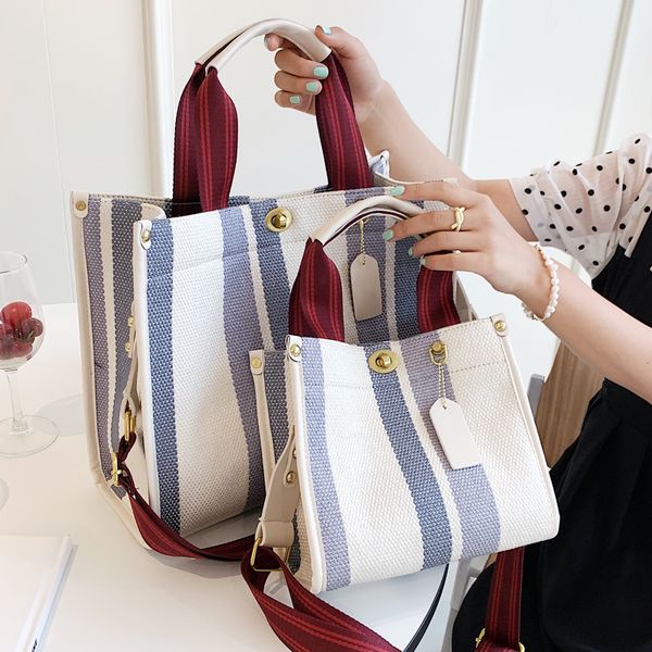 evening bags large tote casual stripe canvas handbag for women wide shoulder strap female trendy texture 230322
evening bags large tote casual stripe canvas handbag for women wide shoulder strap female trendy texture 230322