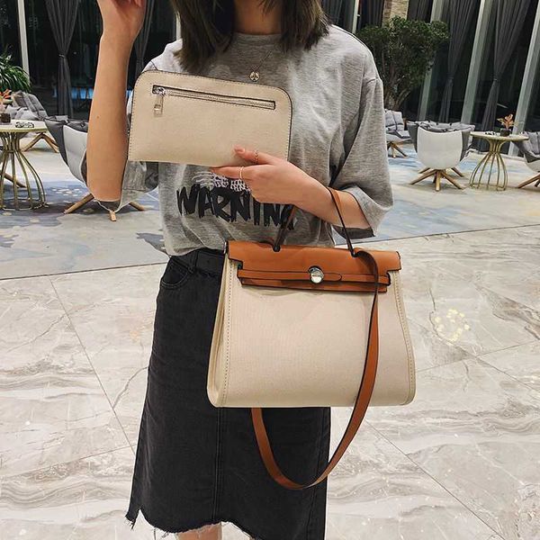 designer bag h small canvas capacity new color women's versatile shoulder portable briefcase
designer bag h small canvas capacity new color women's versatile shoulder portable briefcase