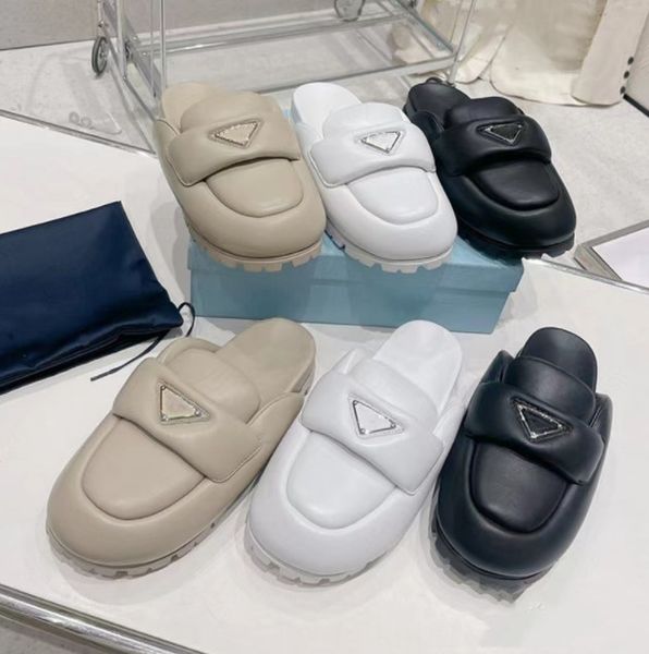 designer shoes triangle logo slippers sandals women slippers new fashion soft sheepskin shoes outdoor beach l baotou round toe thick bottom, Black
designer shoes triangle logo slippers sandals women slippers new fashion soft sheepskin shoes outdoor beach l baotou round toe thick bottom, Black