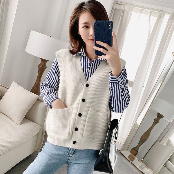 women's vests spring autumn women button v-neck knitted sweaters sleeveless vintage pockets sweater vest female loose solid cloth b91 2, Black;white
women's vests spring autumn women button v-neck knitted sweaters sleeveless vintage pockets sweater vest female loose solid cloth b91 2, Black;white