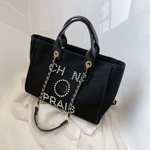 evening bags new designer handbags pearl beach bag canvas portable high-capacity fashion trend women bags r230322
evening bags new designer handbags pearl beach bag canvas portable high-capacity fashion trend women bags r230322