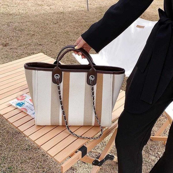 purses striped chain handbag personalized fashion handbag autumn new simple color contrast tote bag clearance sale
purses striped chain handbag personalized fashion handbag autumn new simple color contrast tote bag clearance sale