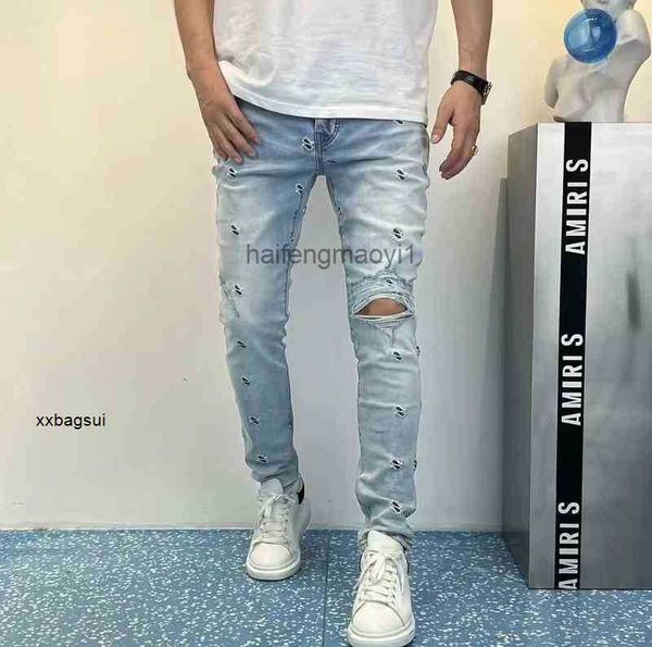 mens jeans designer european and american high street black light blue trend perforated embroidered trousers casual slim fashion
mens jeans designer european and american high street black light blue trend perforated embroidered trousers casual slim fashion