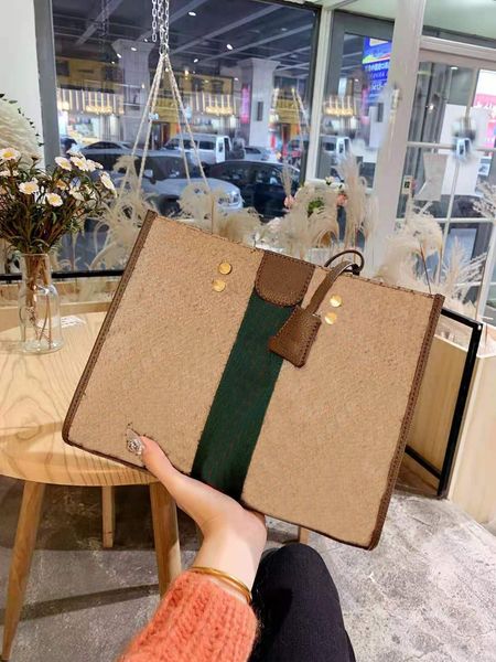 the new fashion bags ladies purses handbags large wide stripe shopping one shoulder both print women totes handbag
the new fashion bags ladies purses handbags large wide stripe shopping one shoulder both print women totes handbag