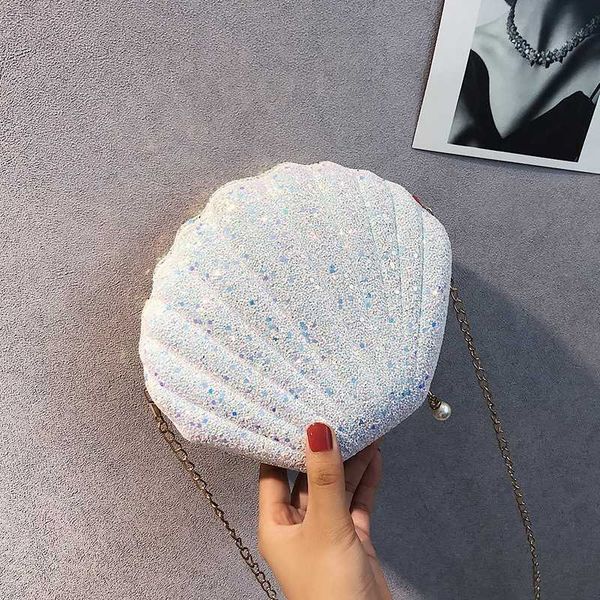design 2020 fashion women bags shiny shell messenger mini female small fairy all-match shoulder luxury
design 2020 fashion women bags shiny shell messenger mini female small fairy all-match shoulder luxury