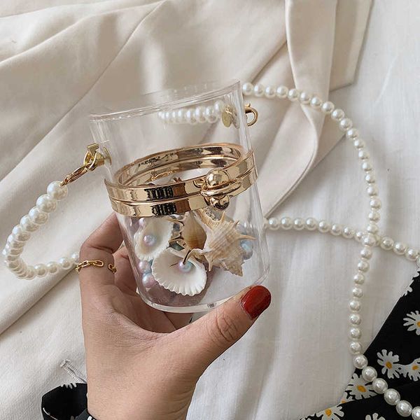 wallets women shoulder bag 2022 pvc purse and handbag female shopper fashion casual solid color pearl chain transparent barrel shape y2303, Red;black
wallets women shoulder bag 2022 pvc purse and handbag female shopper fashion casual solid color pearl chain transparent barrel shape y2303, Red;black