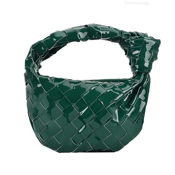 botega venates jodie mini teen intrecciato pouch fashion patent leather woven one shoulder women's texture personalized portable shell
botega venates jodie mini teen intrecciato pouch fashion patent leather woven one shoulder women's texture personalized portable shell