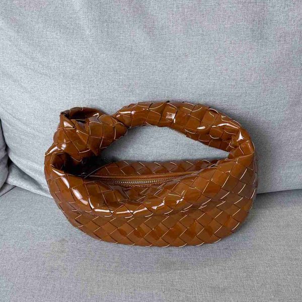 botega venates jodie mini teen intrecciato pouch women's woven knotting croissant fashionable highgrade hand bag siaa
botega venates jodie mini teen intrecciato pouch women's woven knotting croissant fashionable highgrade hand bag siaa