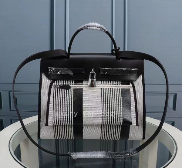aaaaa 2023new fashion birkin h r latch canvas internal and external suture handbag lady cowhide shoulder bag large capacity purse
aaaaa 2023new fashion birkin h r latch canvas internal and external suture handbag lady cowhide shoulder bag large capacity purse
