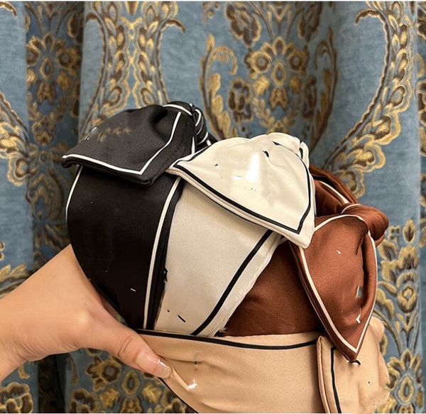 women hair band print wide brim knotted head hoop small fabric headband spun cloth hair hoop factory supply, Black;brown
women hair band print wide brim knotted head hoop small fabric headband spun cloth hair hoop factory supply, Black;brown