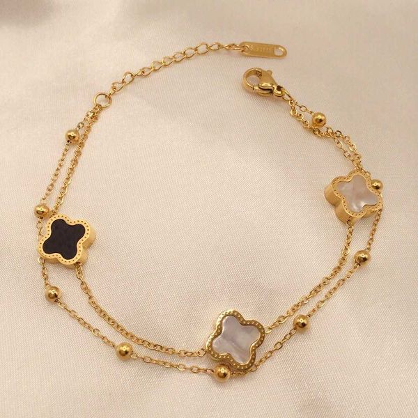 black and white fritillary female double-sided multi-layer four-leaf clover ins simple fashion buckle bracelet
black and white fritillary female double-sided multi-layer four-leaf clover ins simple fashion buckle bracelet