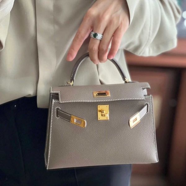 designer bags kellies bag women's leather second-generation new mini portable palm shoulder messenger
designer bags kellies bag women's leather second-generation new mini portable palm shoulder messenger