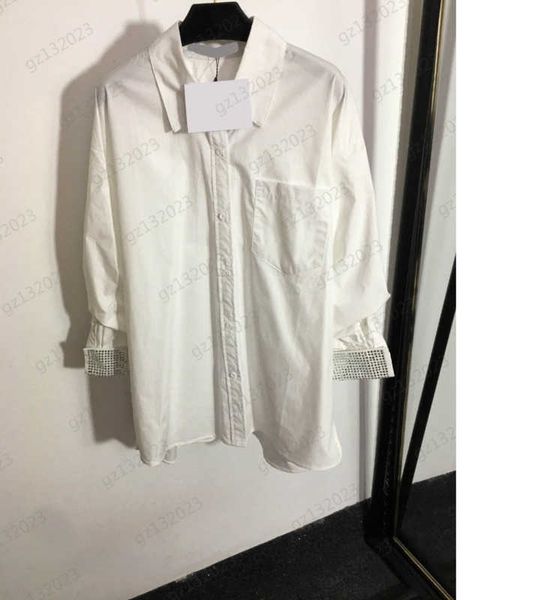white blouses luxury drill decoration cuff lapel pocket shirts draw pleated seven-point sleeve solid color temperament blouse women designer
white blouses luxury drill decoration cuff lapel pocket shirts draw pleated seven-point sleeve solid color temperament blouse women designer