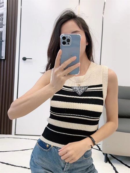 triangle striped cami tank for women: sleek and slim-fitting sleeveless knitwear for layering or wearing, White
triangle striped cami tank for women: sleek and slim-fitting sleeveless knitwear for layering or wearing, White