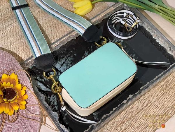 designer brand crossbody bag men women classic camera bag color matching wide shoulder strap women's bag tassel one shoulder messenger
designer brand crossbody bag men women classic camera bag color matching wide shoulder strap women's bag tassel one shoulder messenger